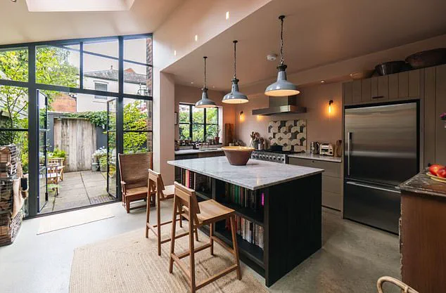 Homeowner Defends All-Black Townhouse Amid Trolls' 'Horrifying' Criticisms, Sparking Debate on Personal Expression vs. Community Aesthetics