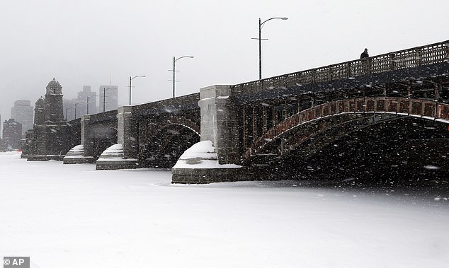 Boston Officials Renew Warnings as Residents Brave Frozen Charles River's Treacherous Ice
