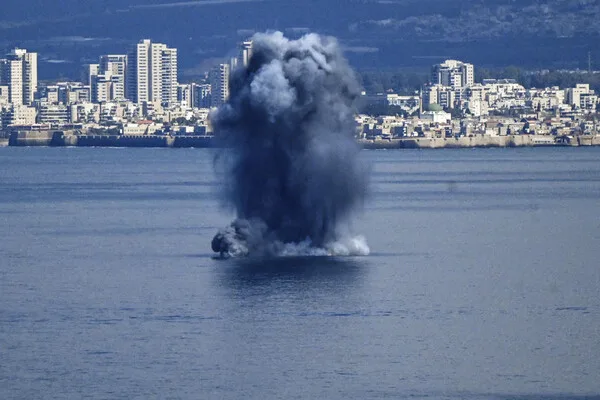 Hezbollah Launches Rocket Attack on Israeli Naval Base in Haifa, Escalating Regional Tensions