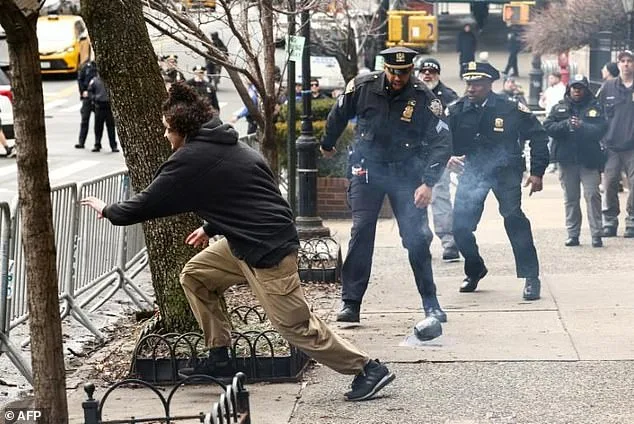 NYPD Assistant Chief's Viral Barrier Leap Sparks National Conversation on Heroism and Terrorism