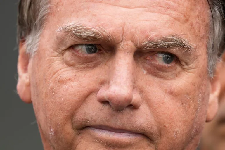 Bolsonaro Hospitalized with Bronchopneumonia Linked to 2018 Stabbing; Ongoing Health Concerns Persist