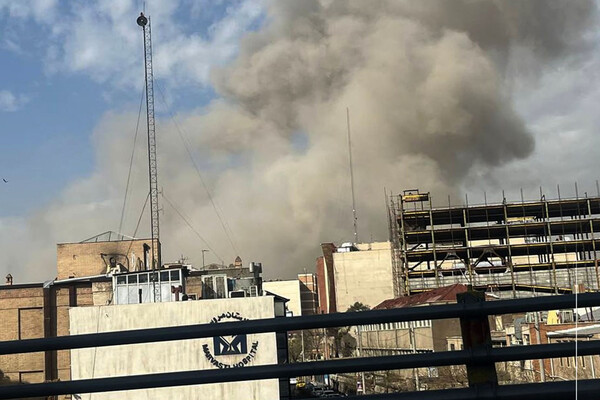 Rocket Strike Hits Tehran Building Amid Heightened Tensions and U.S. Military Preparations