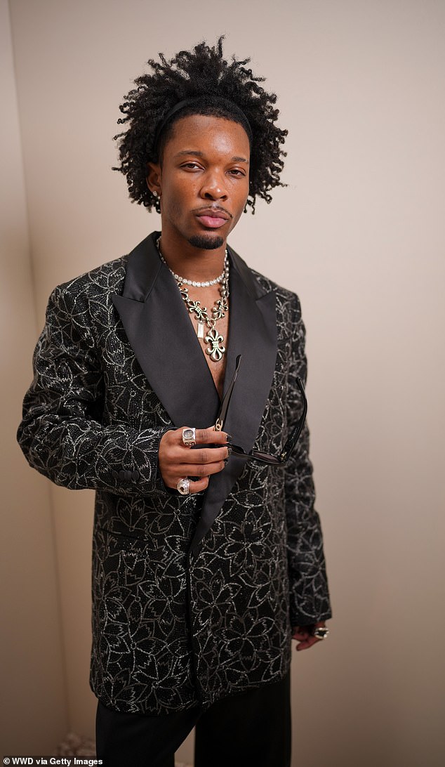 Police detain singer D4vd on murder charges after finding teen's remains in Tesla.