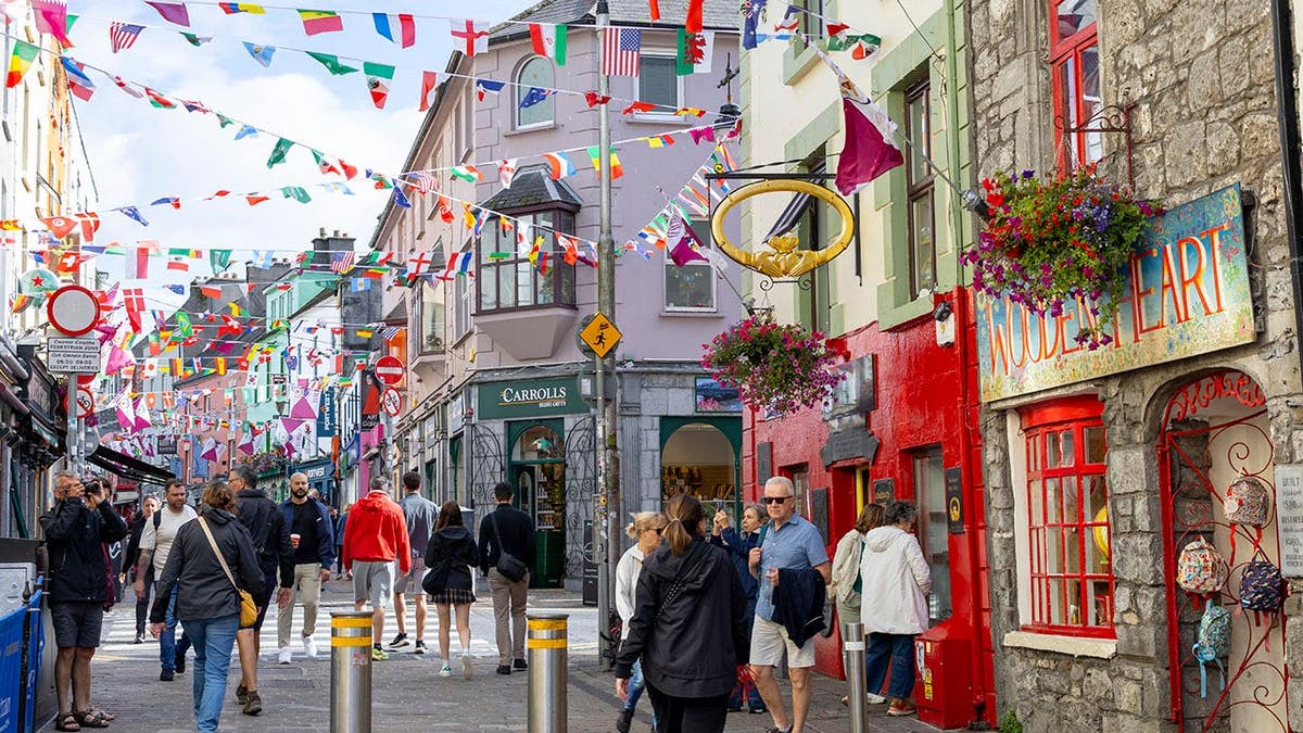Galway considers controversial nightly tourist tax to manage overtourism crisis.