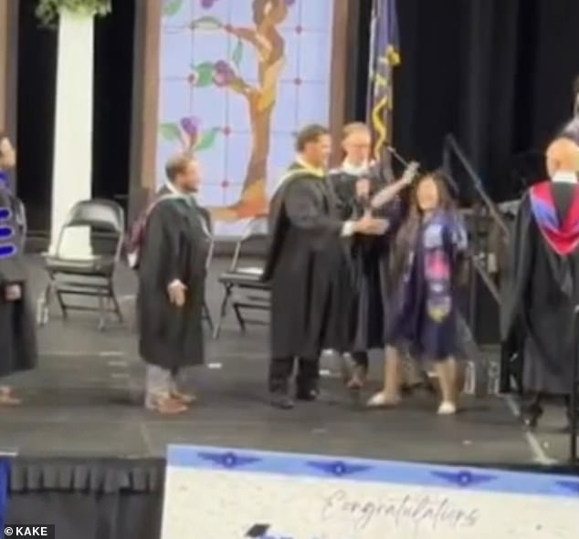 Graduation Chaos: Admin Forces Handshakes on Stage at Wichita High