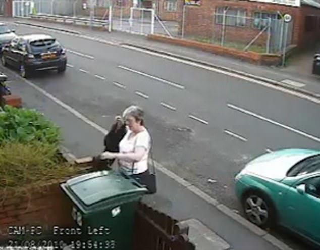 Woman's viral act of trapping a cat in a bin forever changes her life.