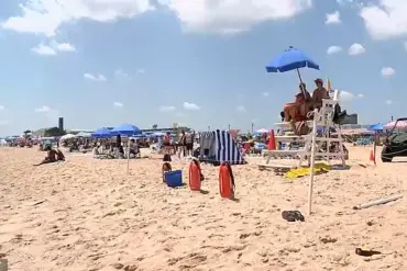 Lifeguard Impaled by Umbrella Vows to Return Despite Injuries, Highlighting Beach Safety Risks