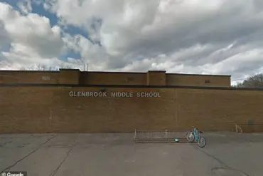 Arrest of Middle School Librarian in Massachusetts Over Alleged Distribution of Child Pornography via Encrypted Group Chat