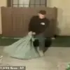 Surveillance Footage Captures Husband Dragging Wrapped Object Hours Before Wife's Disappearance